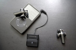 An iPod, Kleer transmitter and the wireless earbuds.